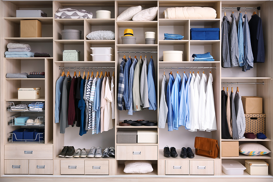 A men’s closet, neatly organized for a new year’s resolution.